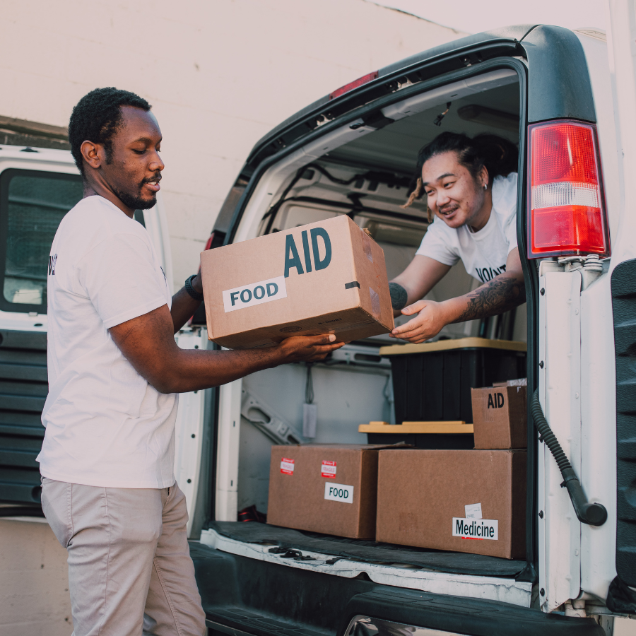 Loading Donations into the back of a van